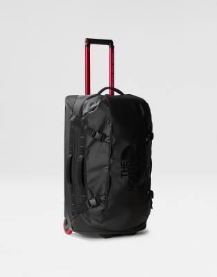 The North Face Base Camp rolling suitcase 28" in black and red