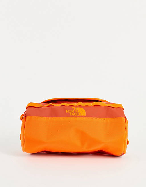 The North Face Base Camp S Travel canister in orange