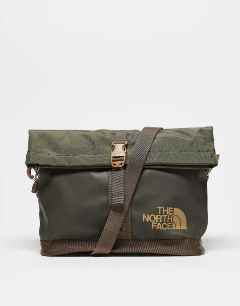 The North Face Base Camp shoulder bag in green with brown detailing - view 1