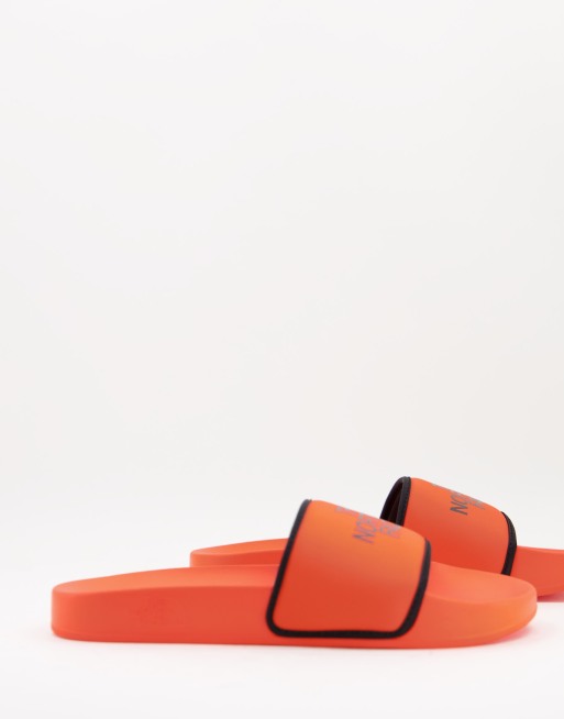 The North Face Base Camp sliders in orange