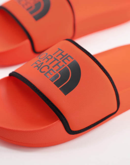 The North Face Base Camp sliders in orange