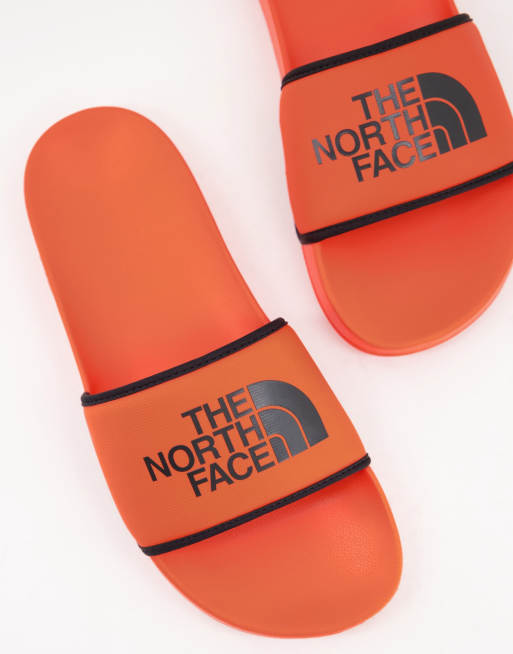 The North Face Base Camp sliders in orange