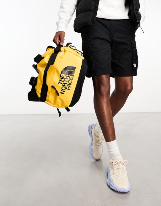 North face duffel small yellow on sale