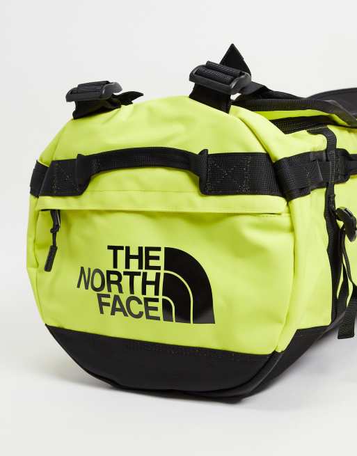 The North Face Base Camp Small Duffel Bag In Yellow Asos