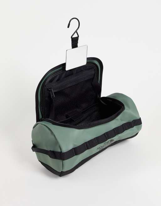 The North Face Base Camp travel canister L wash bag in green ASOS