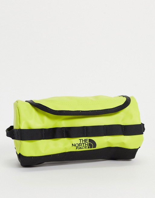 The North Face Base Camp travel canister small wash bag in yellow