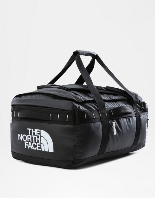 Machine wash according to instructions on care label Base camp voyager duffel 62l in tnf black/tnf white