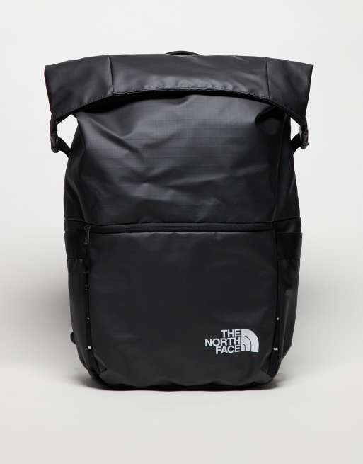 The North Face Base Camp Voyager roll top logo backpack in black ASOS