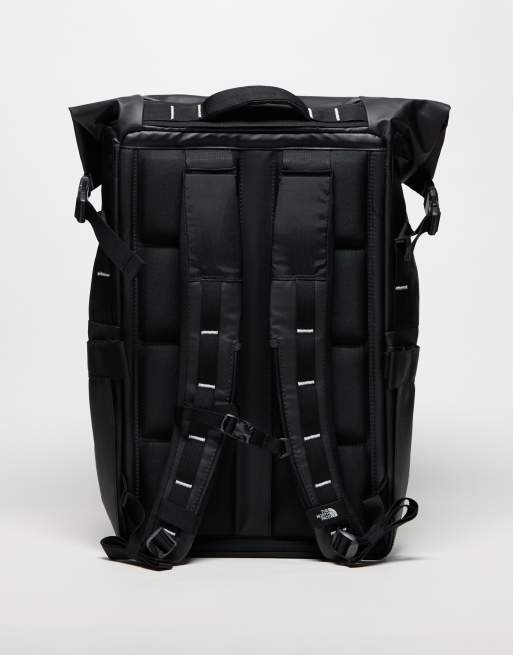 The North Face Base Camp Voyager roll top logo backpack in black ASOS