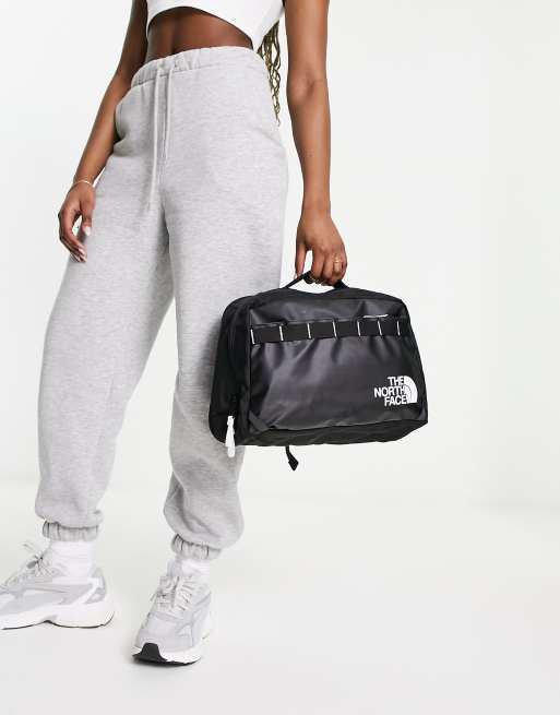 The North Face Base Camp Voyager sling cross body bag in black | ASOS