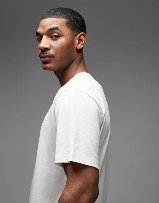 The North Face – Beige t-shirt med bergstryck baktill, 4 av 5