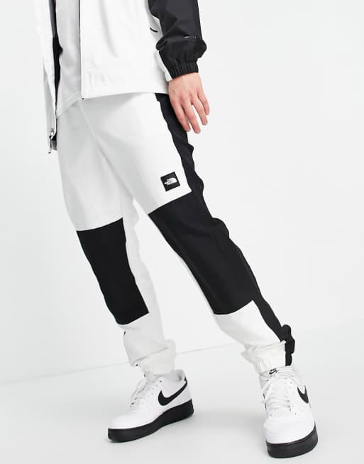 The North Face Black Box track pants in white black ASOS