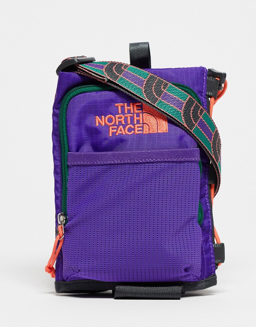 The North Face Borealis bottle holder in green and purple
