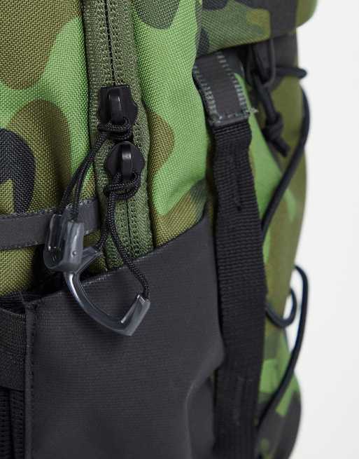 The North Face Borealis Mini backpack in camo ASOS