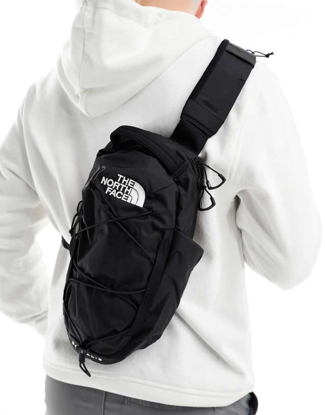 The North Face Borealis sling bag in black | ASOS