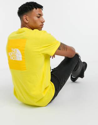 yellow north face top