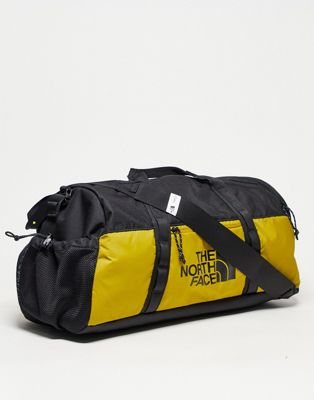 The North Face Bozer 35l small duffel bag in yellow and black