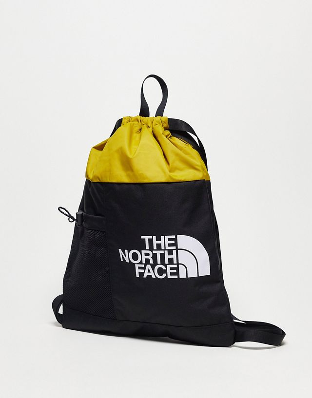 The North Face Bozer Cinch pack in yellow and black