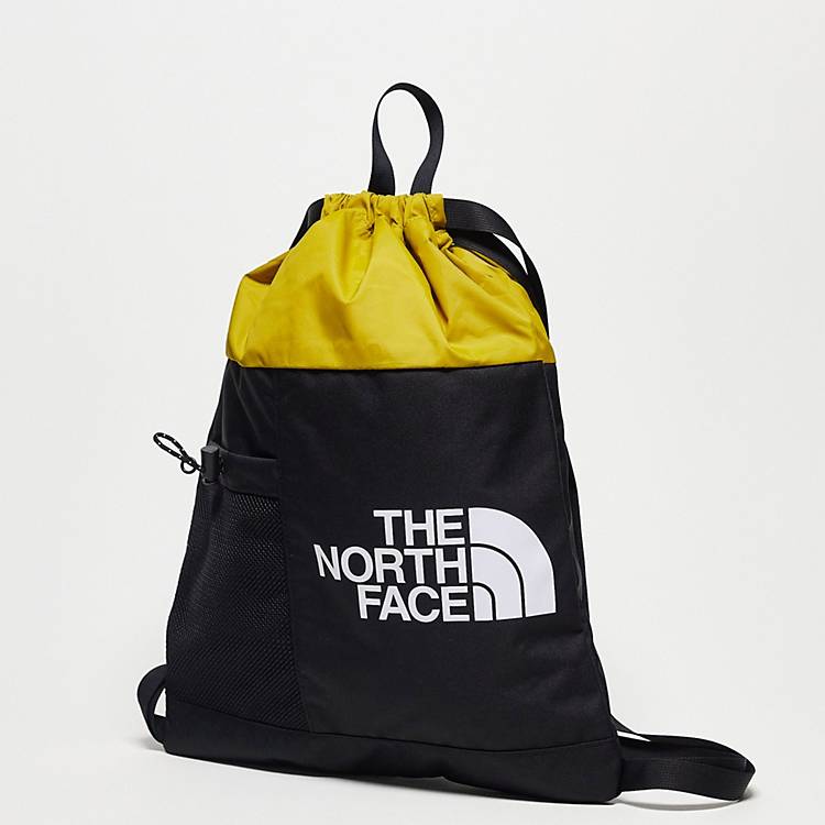 pomp Nageslacht Zo veel The North Face Bozer Cinch pack in yellow and black | ASOS