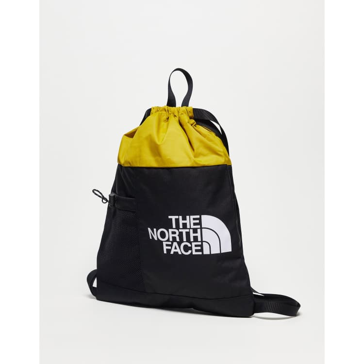 The North Face Bozer Cinch pack in yellow and blackthe north face