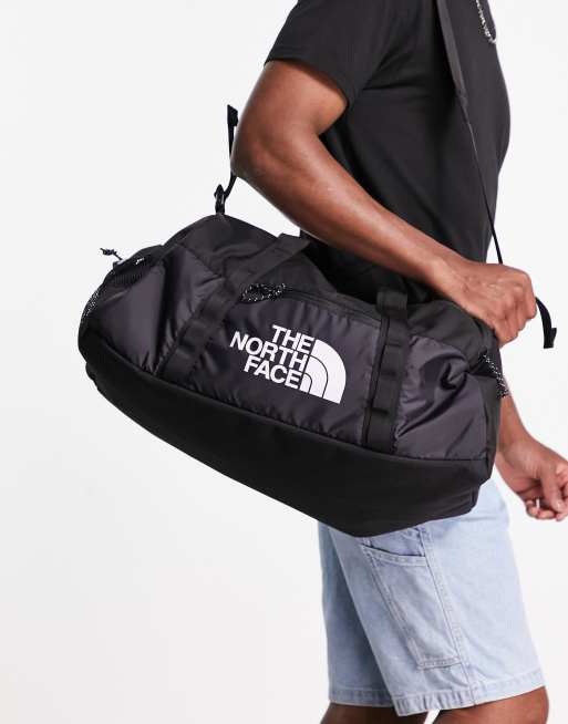 The North Face Bozer duffel bag in black | ASOS