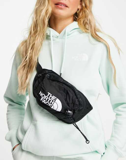 The North Face Bozer fanny pack in black ASOS