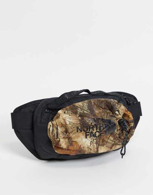 The North Face Bozer III bum bag in camo ASOS
