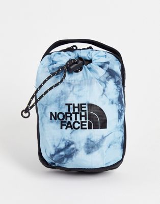 The North Face Bozer III cross body bag in tie dye blue