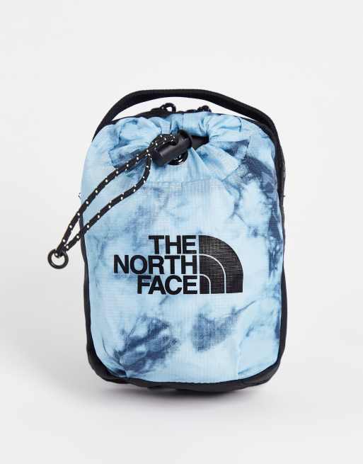 The North Face Bozer III cross body bag in tie dye blue ASOS