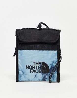 The North Face Bozer III neck pouch in tie dye blue