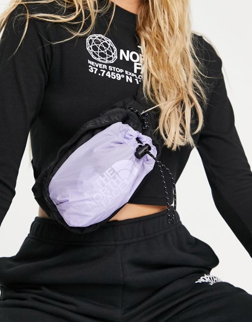 The North Face Bozer III small fanny pack in lilac | ASOS