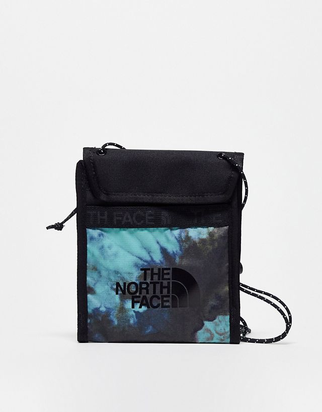 The North Face Bozer neck pouch in black and wasabi green tie dye