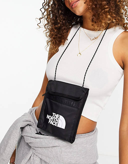 The North Face Bozer neck pouch in black | ASOS