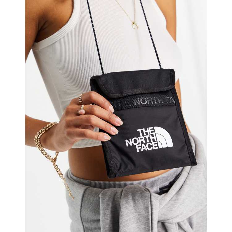 The North Face Bozer neck pouch in black ASOS