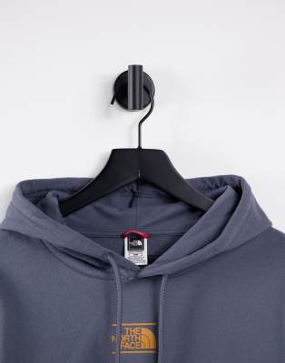 grey and orange north face hoodie