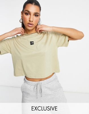 Logo cropped t-shirt in beige Exclusive 