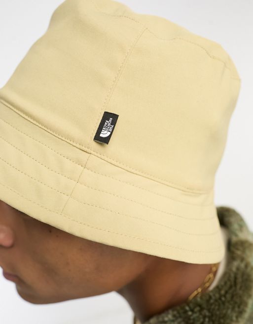 The North Face Class V Reversible bucket hat in khaki and stone