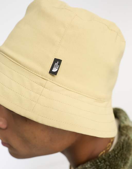 The North Face Class V Reversible bucket hat in khaki and stone | ASOS