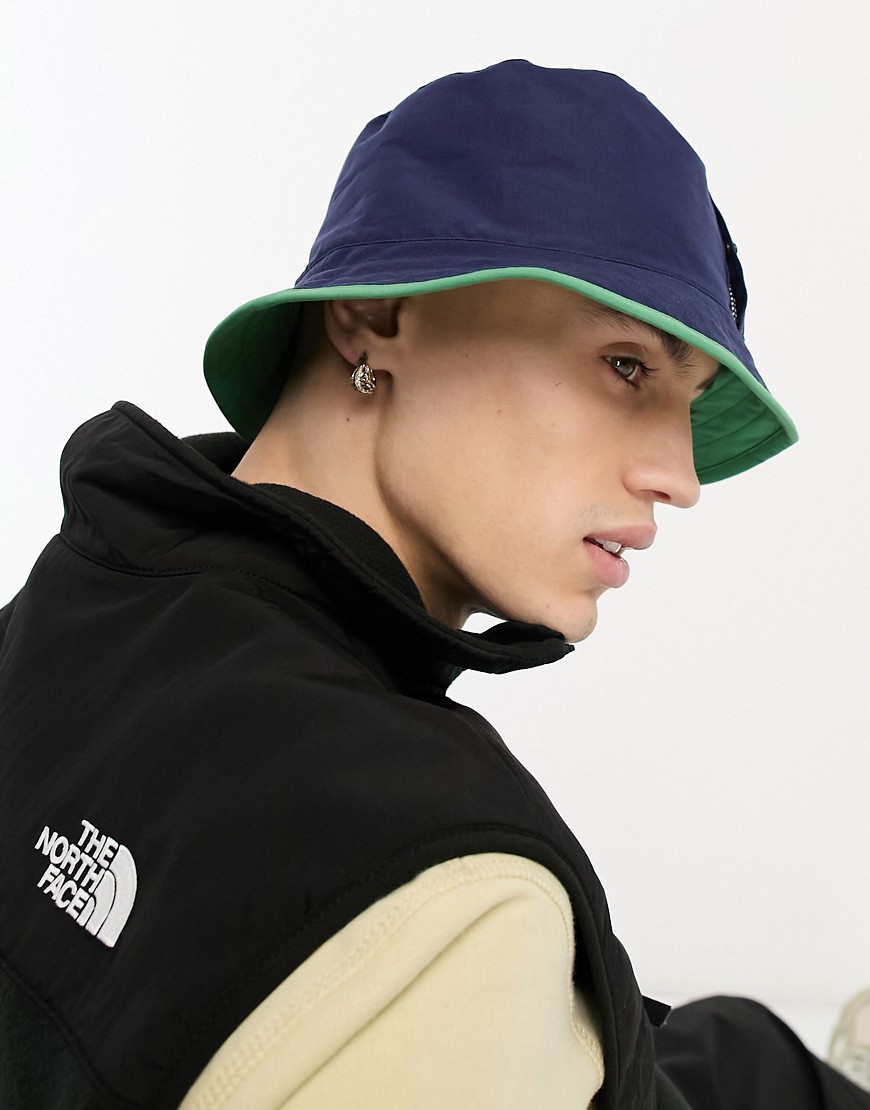 The North Face Class V Reversible bucket hat in navy and green