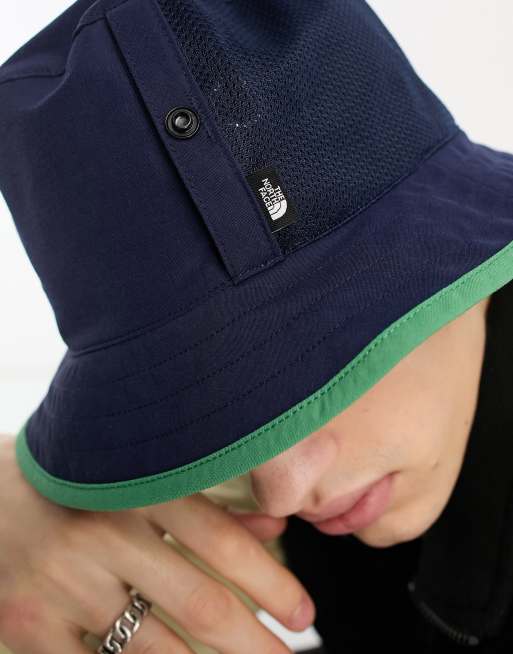 The North Face Class V Reversible bucket hat in navy and green