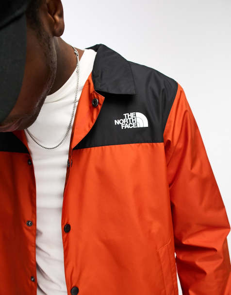 The North Face Coach jacket in orange and black Exclusive at ASOS