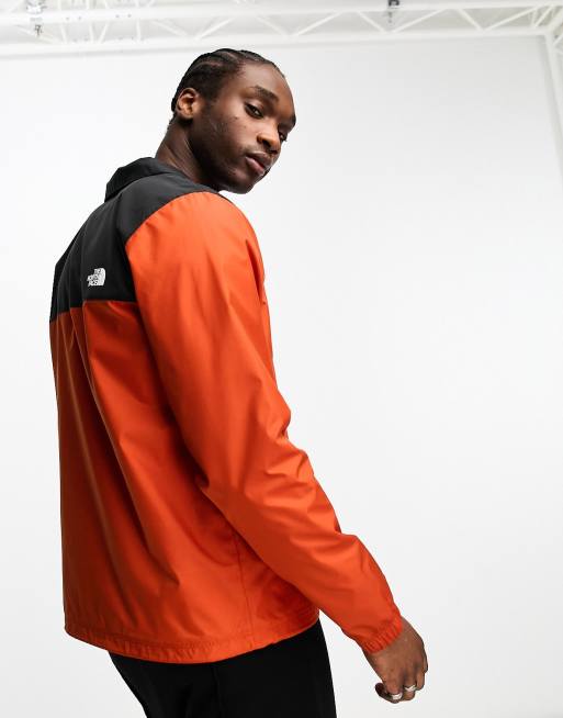 The north face orange and black on sale jacket