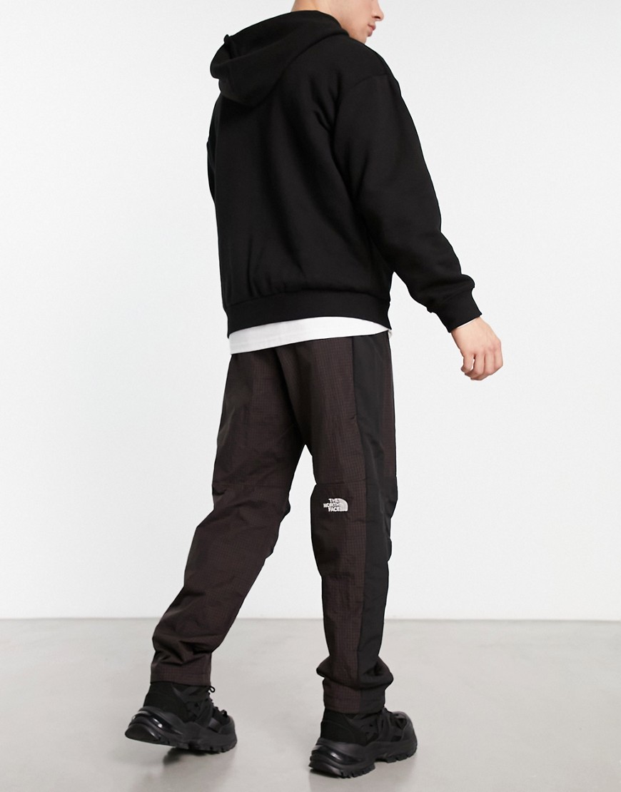 The North Face Convin ripstop sweatpants in red and black