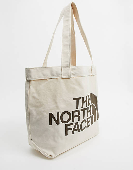 The North Face Cotton logo tote bag in beige | ASOS