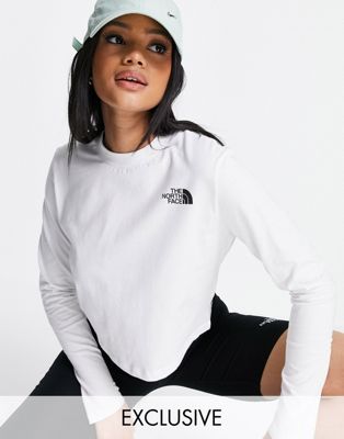 The North Face cropped long sleeve t-shirt in white Exclusive at ASOS | ASOS