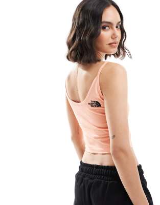 The North Face The North Face cropped strappy tank in orange Exclusive at ASOS