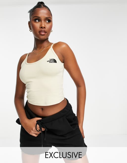 The North Face cropped tank top in beige Exclusive at ASOS 