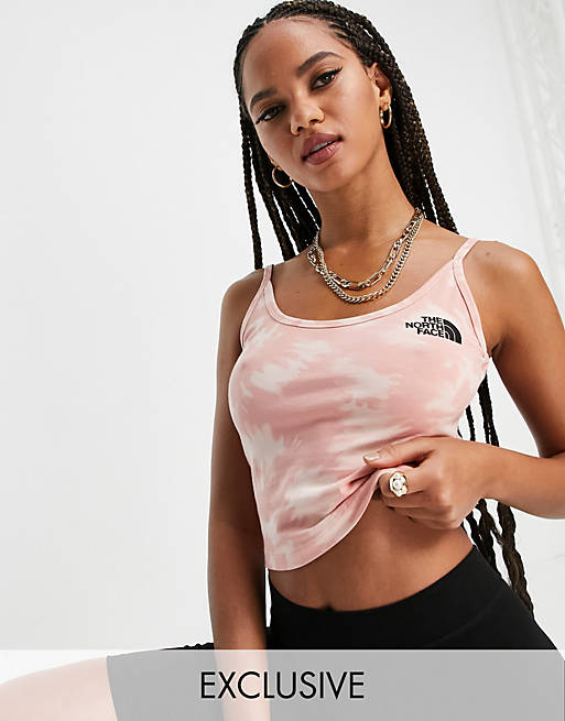 The North Face cropped vest top in pink tie dye Exclusive at ASOS