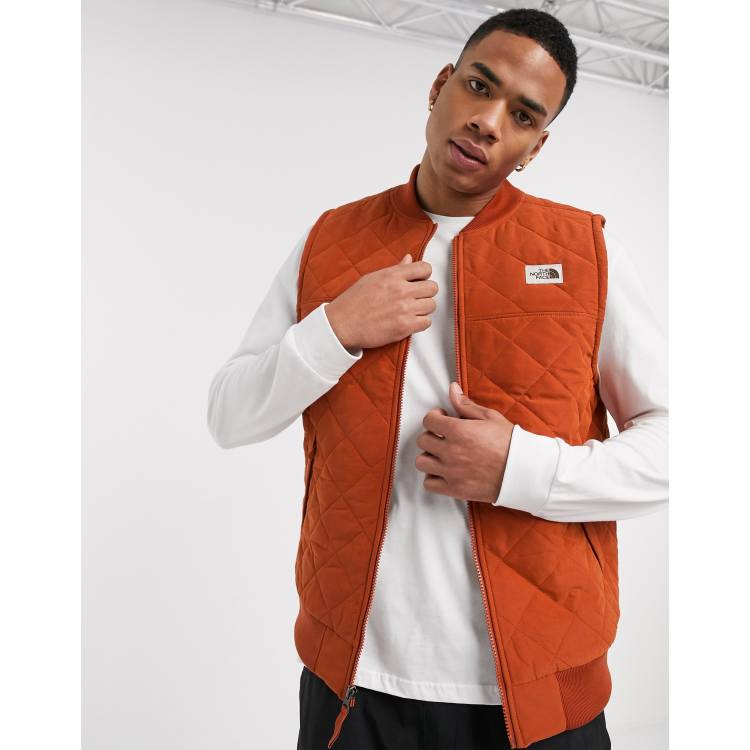 The North Face Cuchillo insulated tank top in red | ASOS