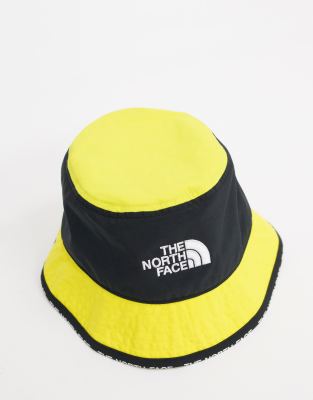 black and yellow bucket hat